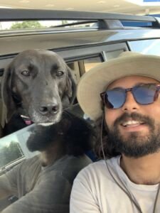 Mario Sultan and his black lab mix, Bonnie taking a selfie.