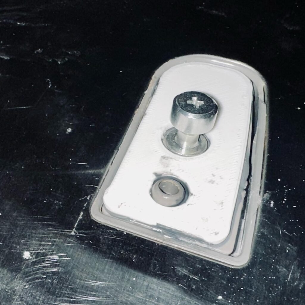 Custom 3D printed plate to fix a broken Samsung refrigerator door handle bracket. Epoxied to the bracket. Fixed!