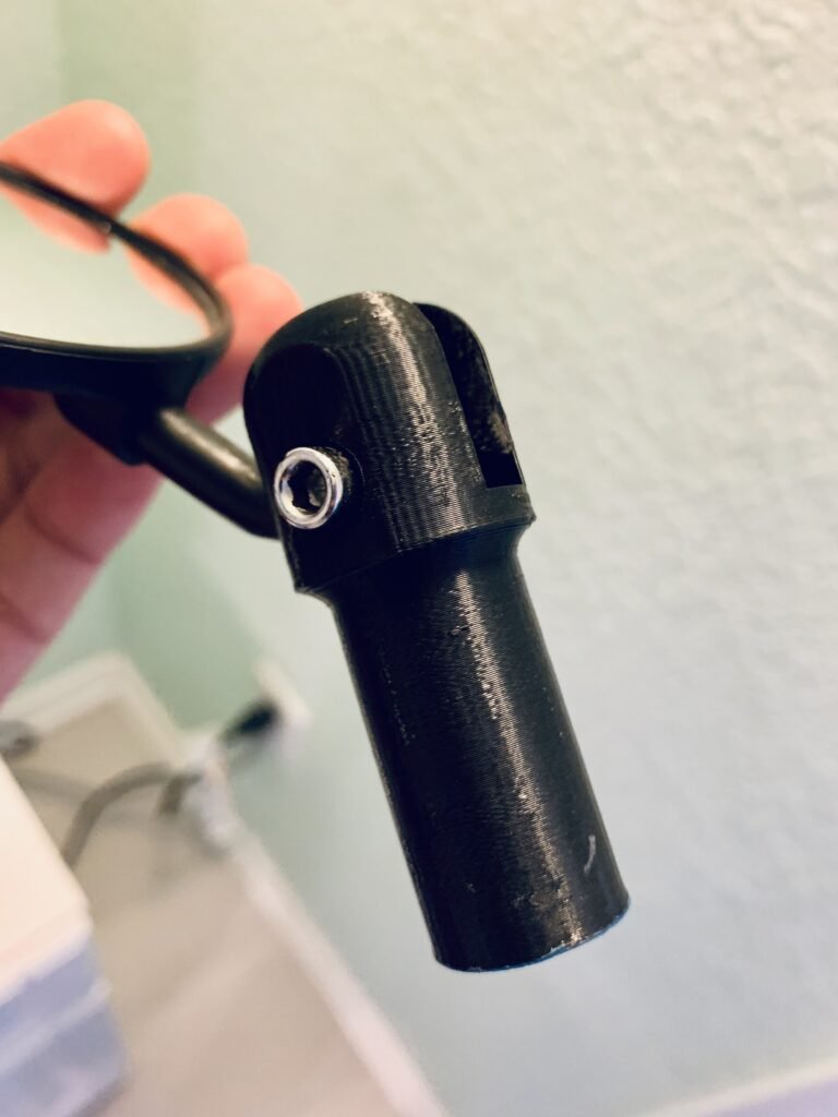 Swiveling Bike Mirror Handlebar BracketThe bracket that came with the mirror which fits in the end of the handlebar would slip out as I'm riding and the bar is vibrating. So I 3D Printed a more permanent solution which I've been using for 2.5 years so far. I had to print it in PETG because it kept loosening when I made it in PLA and stored in my shed. Also made an end cap on the other side because those pesky things keep falling out.