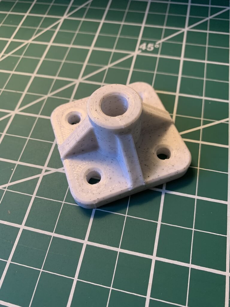 3d printed bracket printed using marble PETG.