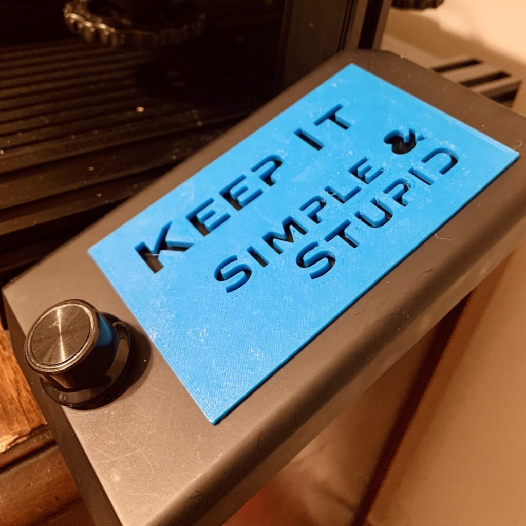 3D Printed a Ender 3 V2 Neo 3D Printer LCD Cap - "Keep It Simple & Stupid" in blue. 