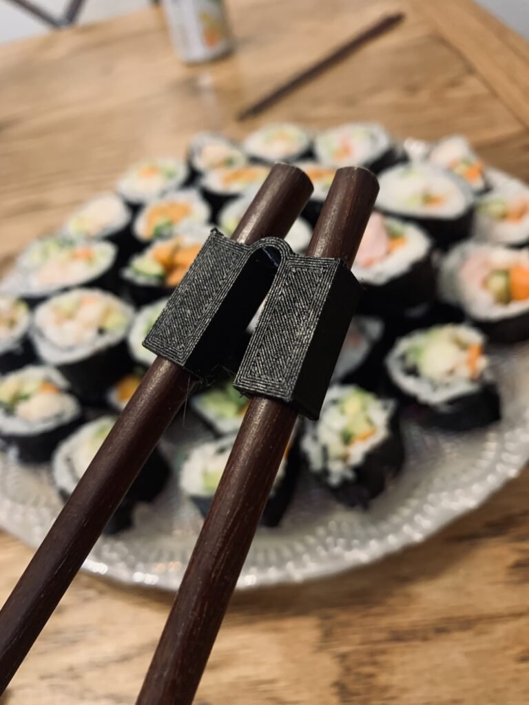 Chopstick Trainer/Bracket. I want to eat my sushi and enjoy it, without looking like a fool.