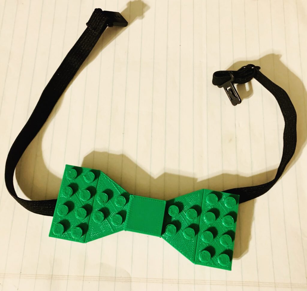 Lego-inspired bowtie, green, with strap installed. 