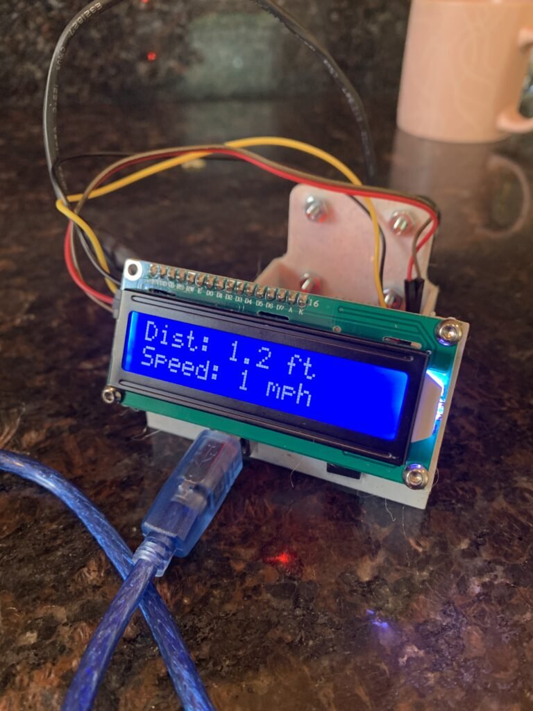 I designed and built a sturdy, functional base to securely hold the Arduino, Garmin LiDAR sensor, LCD display, and all necessary wiring. This robust foundation enables me to prototype a device that measures the distance to the car ahead and detects changes in its speed, providing critical alerts when the vehicle slows down. The base is specifically engineered to support the components during testing, ensuring stability and ease of use throughout the development process.