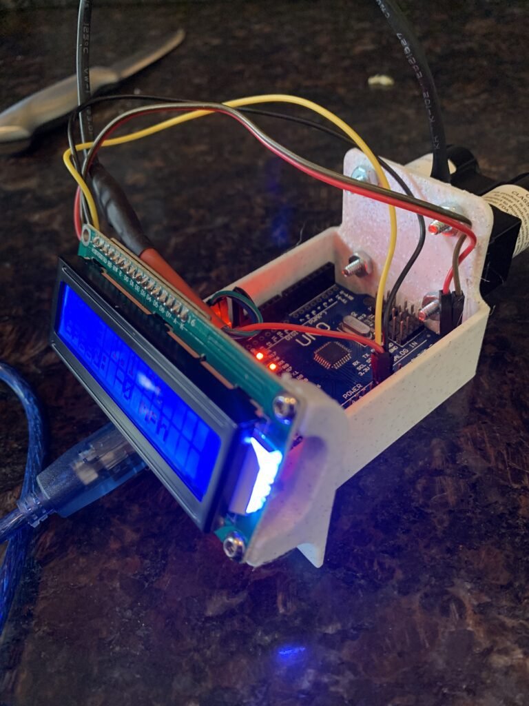 I designed and built a sturdy, functional base to securely hold the Arduino, Garmin LiDAR sensor, LCD display, and all necessary wiring. This robust foundation enables me to prototype a device that measures the distance to the car ahead and detects changes in its speed, providing critical alerts when the vehicle slows down. The base is specifically engineered to support the components during testing, ensuring stability and ease of use throughout the development process.