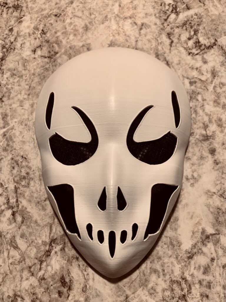 Halloween Mask Based on AI Image. I had the privilege of working on my first custom build as a gift for someone’s husband back Fall of 2023. She asked me to physically create a mask based on this AI generated image she created. It was a great project that involved lots of surface modeling and therefore lots of fine tuning!