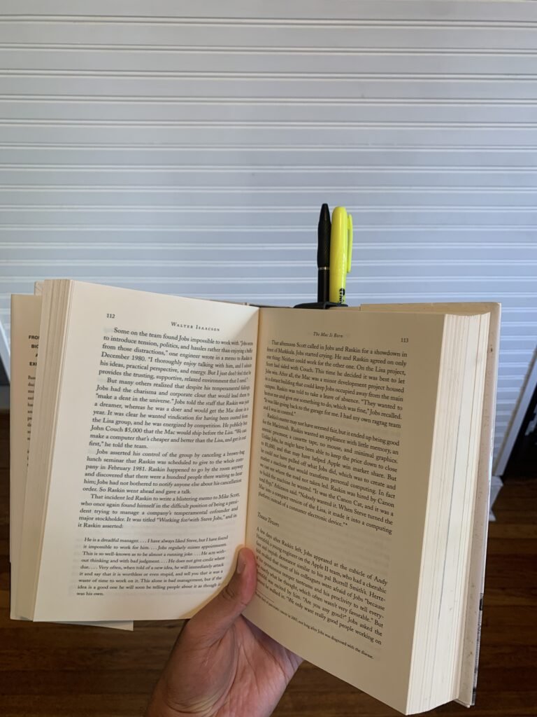 You’re probably wondering…why not simply clip your pen or highlighter to your book? If you’re anyone like me, you write a lot in a book and you prefer to read, when standing or sitting on the couch, or even on the toilet. So instead of setting my pen down on my chest or my ear, I designed an printed a holder that clips into any book and hold a pen and highlighter. 3D Printed Book Pen Holder with Steve Jobs by Walter Isaacson's book