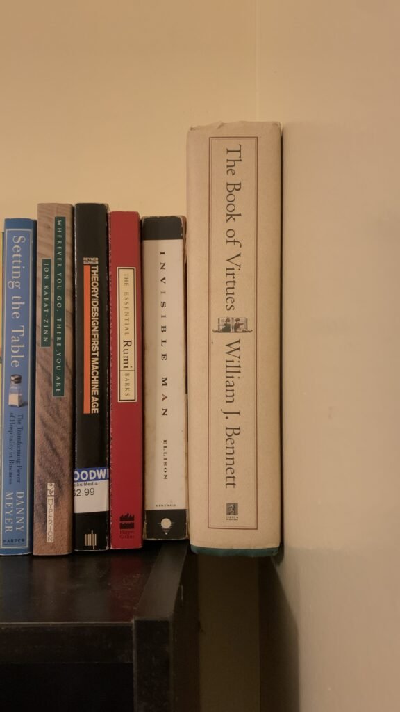 Solving the pesky bookshelf gap! A custom-designed bracket keeps books upright and secure, combining function and style. 3D printed bracket. 