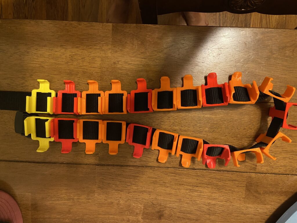 Fireball shooter holder holster sash belt with yellow, orange, red holder 3d printed 3d modeled cad mario sultan designs on my shoulder