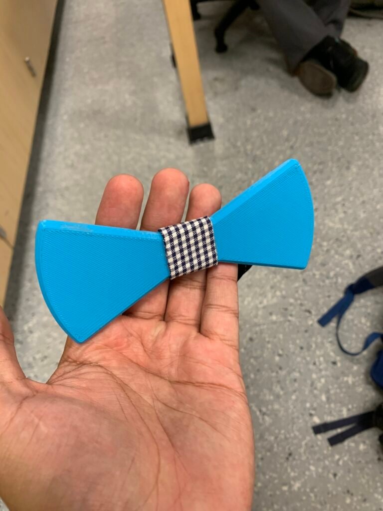 Blue 3d printed bow-tie I used to wear as a teacher. 