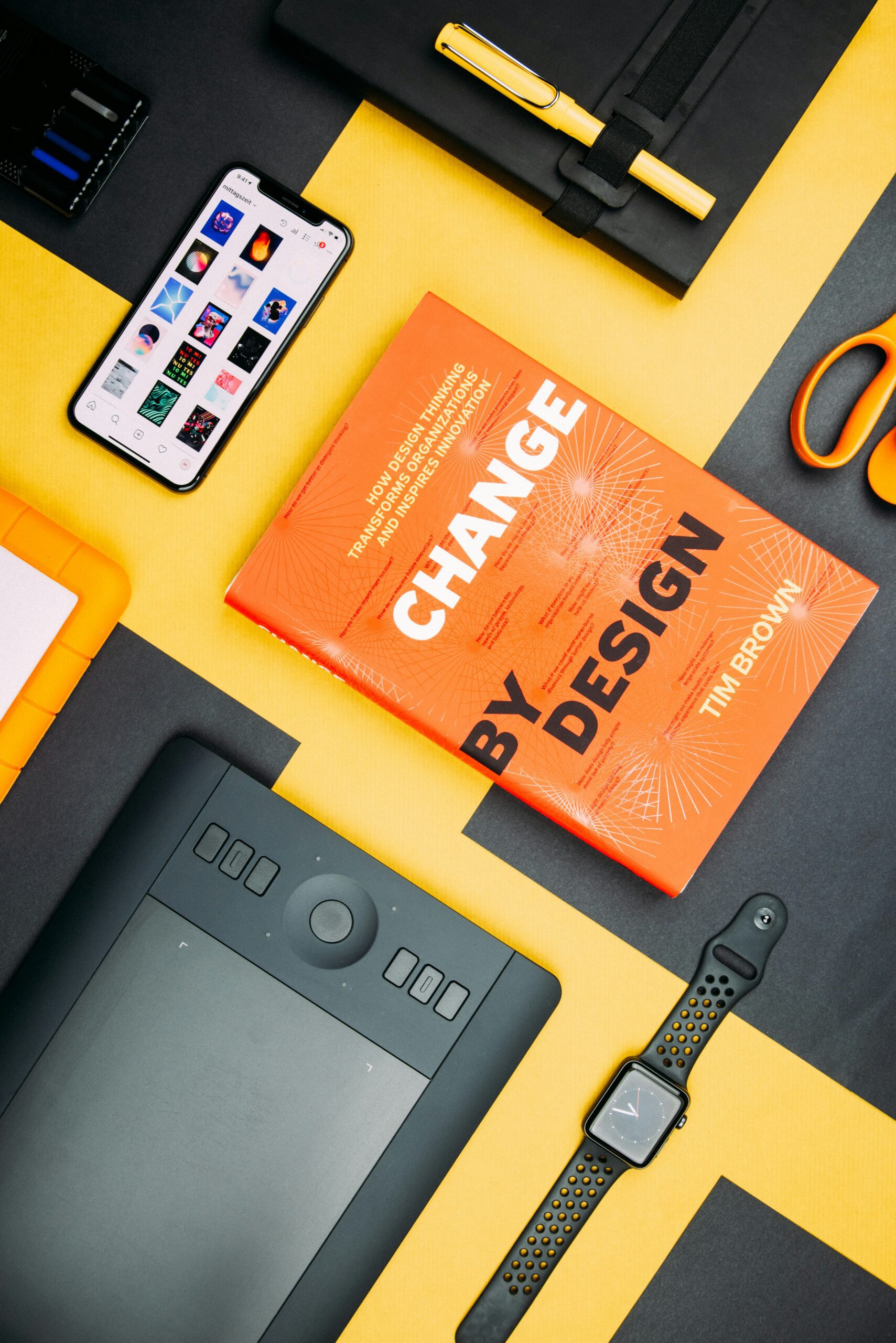 change by design book on desk unplash image